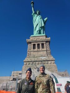 esguerra in front of the statue of liberty
